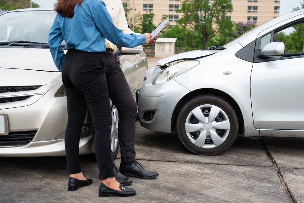 insurance company discussing on the car accident claim form